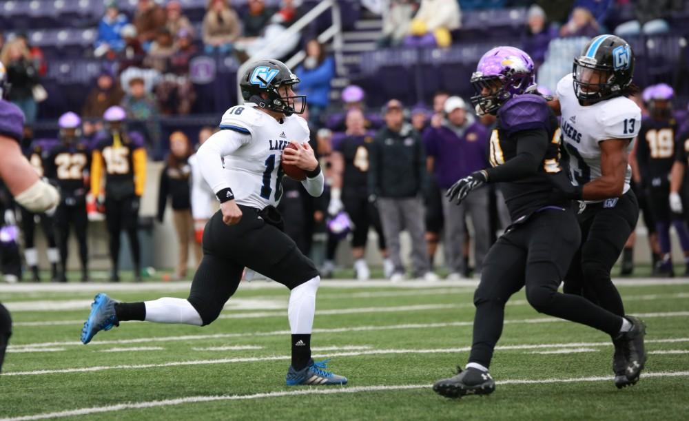 GVL / Kevin Sielaff -  Ollie Ajami (18) runs the ball in for a touchdown.  Grand Valley defeats Ashland with a final score of 45-28 Nov. 22 at Ashland University.