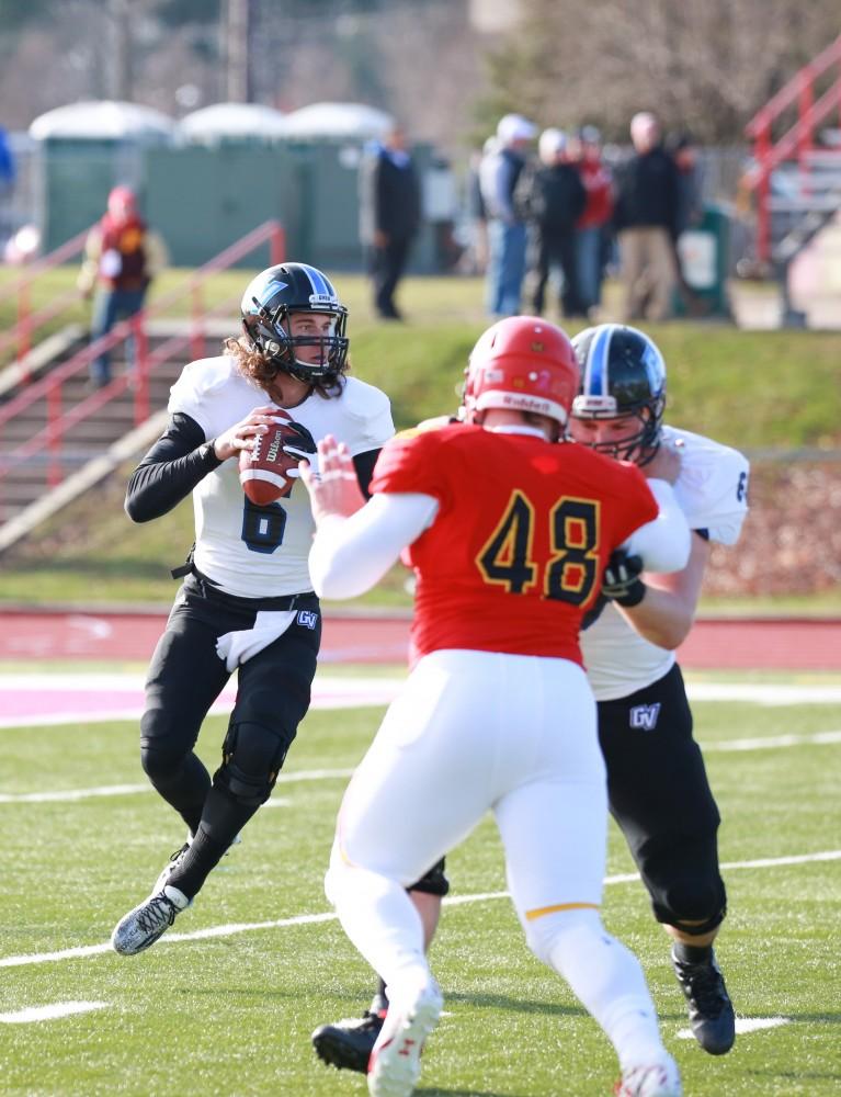 GVL / Kevin Sielaff - Bart Williams (6) steps back in the pocket and prepares to throw a pass down field.  Grand Valley defeats Ferris with a final score of 38-34 at Top Taggart Field Nov. 28 in Big Rapids, MI.