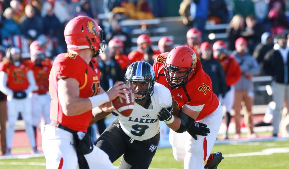 GVL / Kevin Sielaff - Matt Judon (9) moves in on Jason Vander Laan (15).  Grand Valley defeats Ferris with a final score of 38-34 at Top Taggart Field Nov. 28 in Big Rapids, MI.