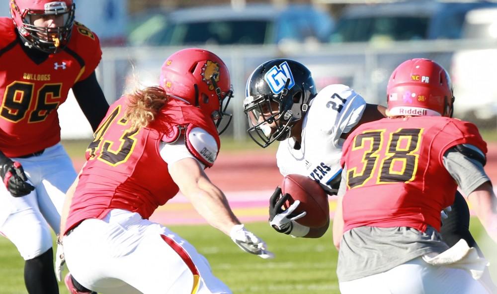 GVL / Kevin Sielaff - Kirk Spencer (27) advances the ball on a kick return.  Grand Valley defeats Ferris with a final score of 38-34 at Top Taggart Field Nov. 28 in Big Rapids, MI.