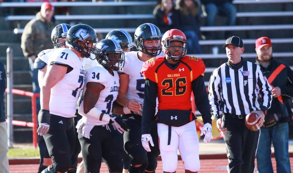 GVL / Kevin Sielaff - Marty Carter (34) celebrates a touchdown run.  Grand Valley defeats Ferris with a final score of 38-34 at Top Taggart Field Nov. 28 in Big Rapids, MI.