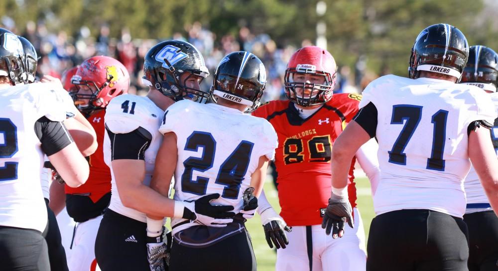 GVL / Kevin Sielaff - Nick Keizer (41) and Matt Williams (24) celebrate a touchdown.  Grand Valley defeats Ferris with a final score of 38-34 at Top Taggart Field Nov. 28 in Big Rapids, MI.