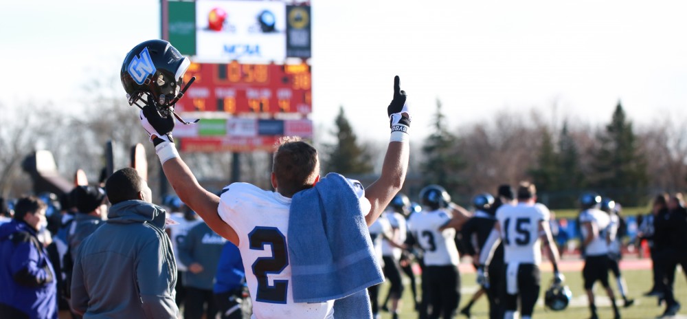 GVL / Kevin Sielaff - Matt Williams (24) celebrates Grand Valleys victory.  Grand Valley defeats Ferris with a final score of 38-34 at Top Taggart Field Nov. 28 in Big Rapids, MI.