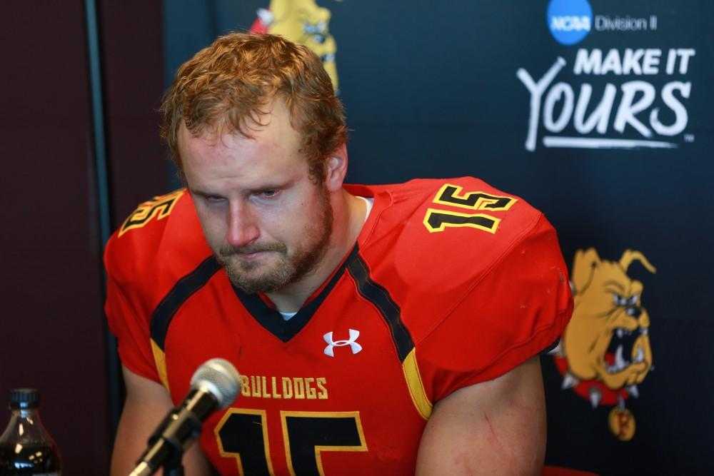 GVL / Kevin Sielaff - Quarterback Jason Vander Laan (15) of Ferris sheds tears after a hard loss to Grand Valley.  Grand Valley defeats Ferris with a final score of 38-34 at Top Taggart Field Nov. 28 in Big Rapids, MI.