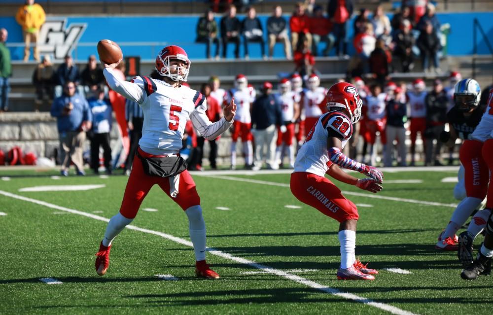 GVL / Kevin Sielaff - SVSU quarterback Brad Odeman Jr. (5) launches a pass down field.  Grand Valley squares off against SVSU Nov. 14 in Allendale. The Lakers hold on and win with a final score of 24-17.