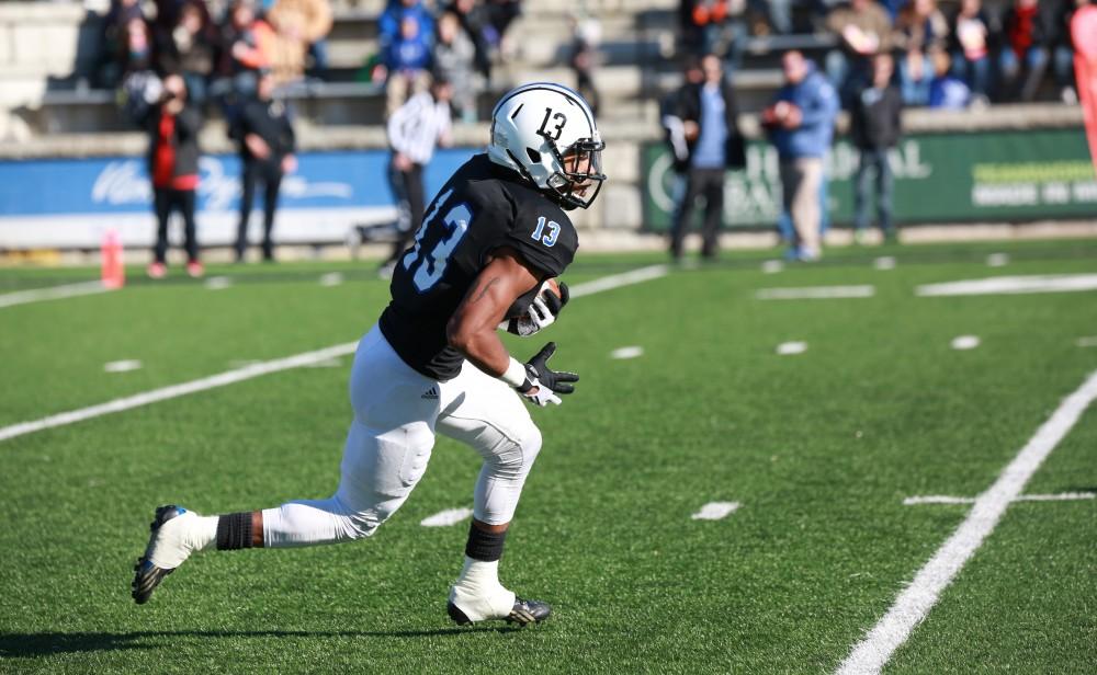 GVL / Kevin Sielaff - Justice Wright (13) carries a punt return to the 30 yard line.  Grand Valley squares off against SVSU Nov. 14 in Allendale. The Lakers hold on and win with a final score of 24-17.