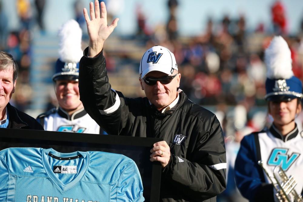 GVL / Kevin Sielaff - The crowd applauds AD Tim Selgo and he is presented with an honorary team jersey.  Grand Valley squares off against SVSU Nov. 14 in Allendale. The Lakers hold on and win with a final score of 24-17.