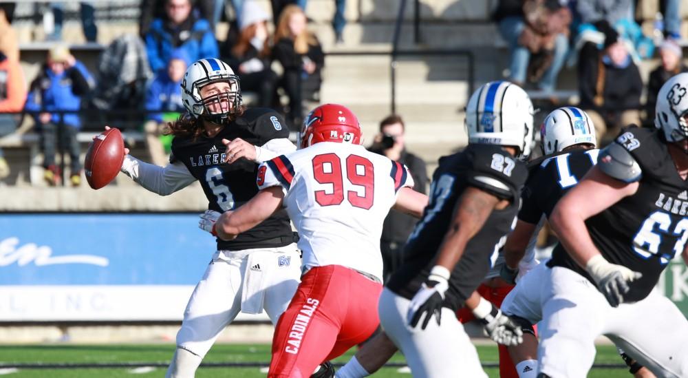 GVL / Kevin Sielaff - Bart Williams (6) prepares a long pass down field.  Grand Valley squares off against SVSU Nov. 14 in Allendale. The Lakers hold on and win with a final score of 24-17.