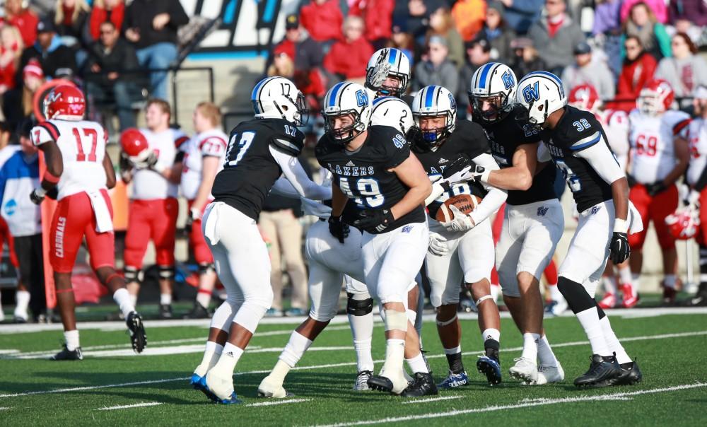 GVL / Kevin Sielaff - Tre Walton (28) celebrates an interception.  Grand Valley squares off against SVSU Nov. 14 in Allendale. The Lakers hold on and win with a final score of 24-17.