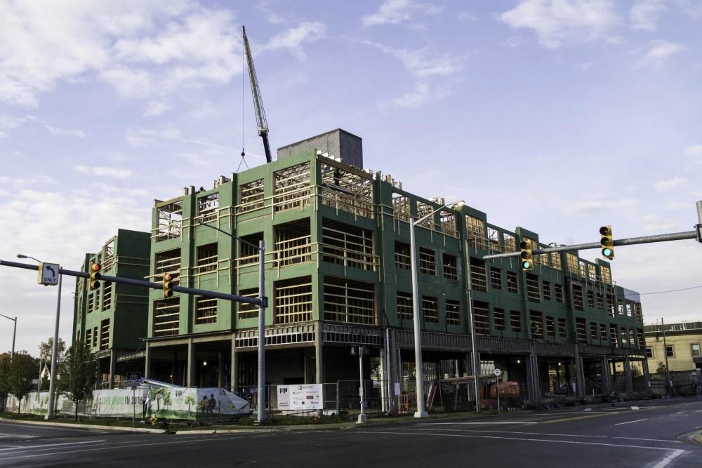 GVL / Sara Carte
Rockford Construction works on Grand Valley’s new housing, Fulton Place, on Fulton Street West on Oct. 21. Fulton Place will be finished are ready for students to move in for the 2016-2017 school year.