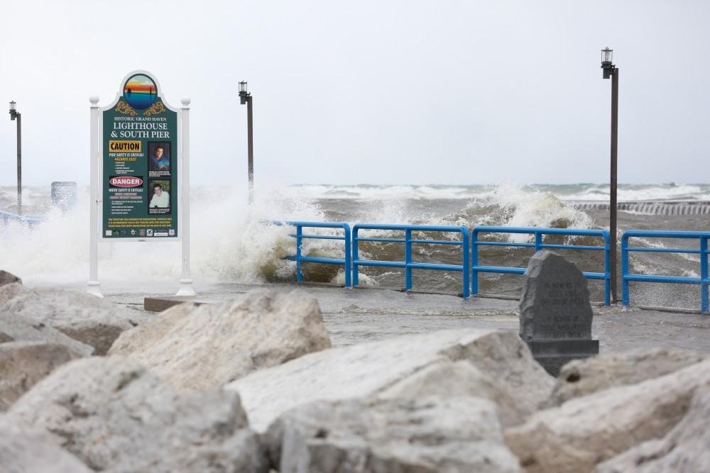 GVL / Kevin Sielaff - Large waves slam the shoreline of Grand Haven State Park Nov. 14.