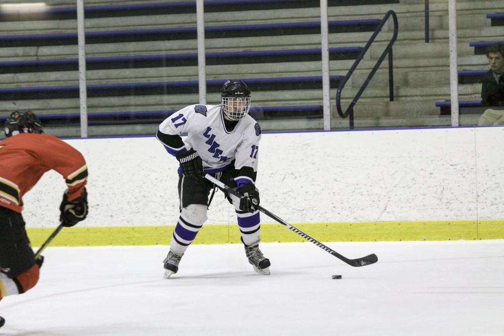 GVL / Sara Carte
Grand Valley’s DII Hockey player, Austin Koleski, looks to pass against Ferris State at Georgetown Ice Arena on Oct. 30.