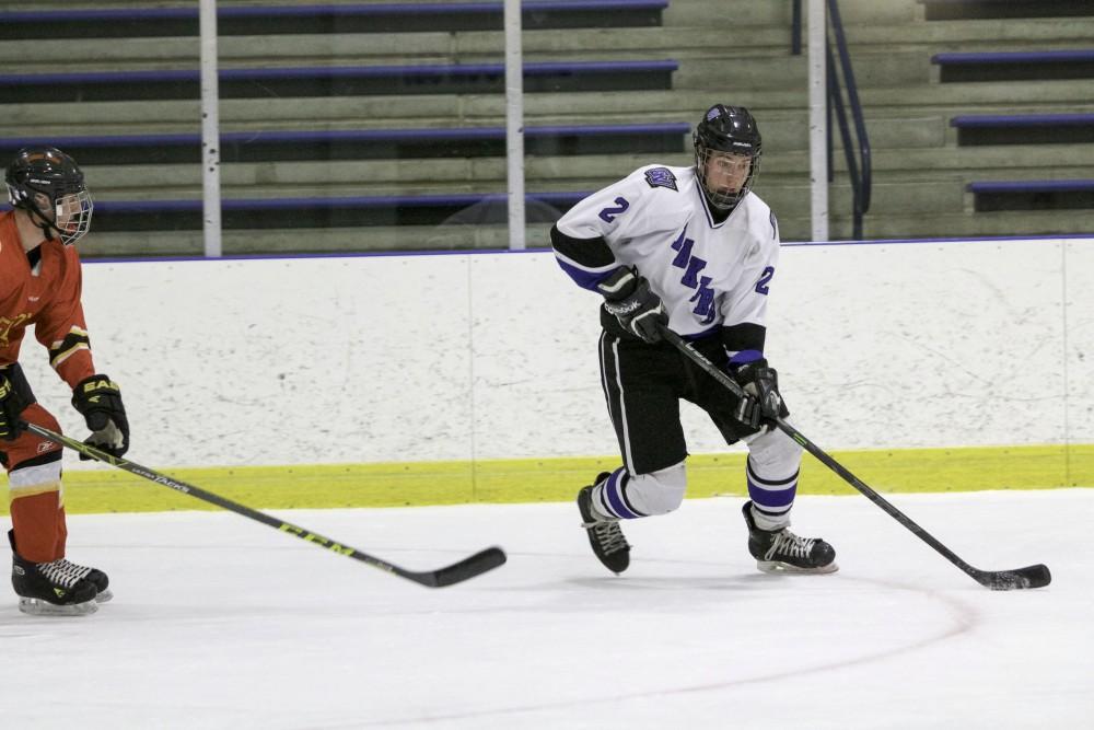 GVL / Sara Carte
Grand Valley’s DII Hockey player, Troy Marrett, keeps the puck away from Ferris State at Georgetown Ice Arena on Oct. 30.