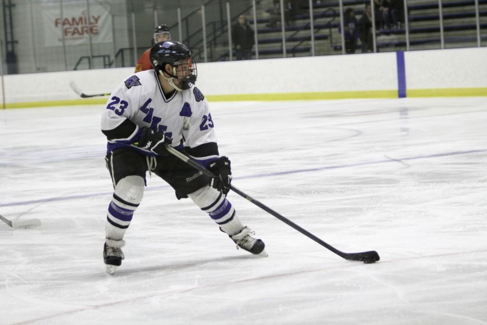 GVL / Sara Carte
Grand Valley’s DII Hockey player, Alex Ostrowski, looks to score against Ferris State at Georgetown Ice Arena on Oct. 30.