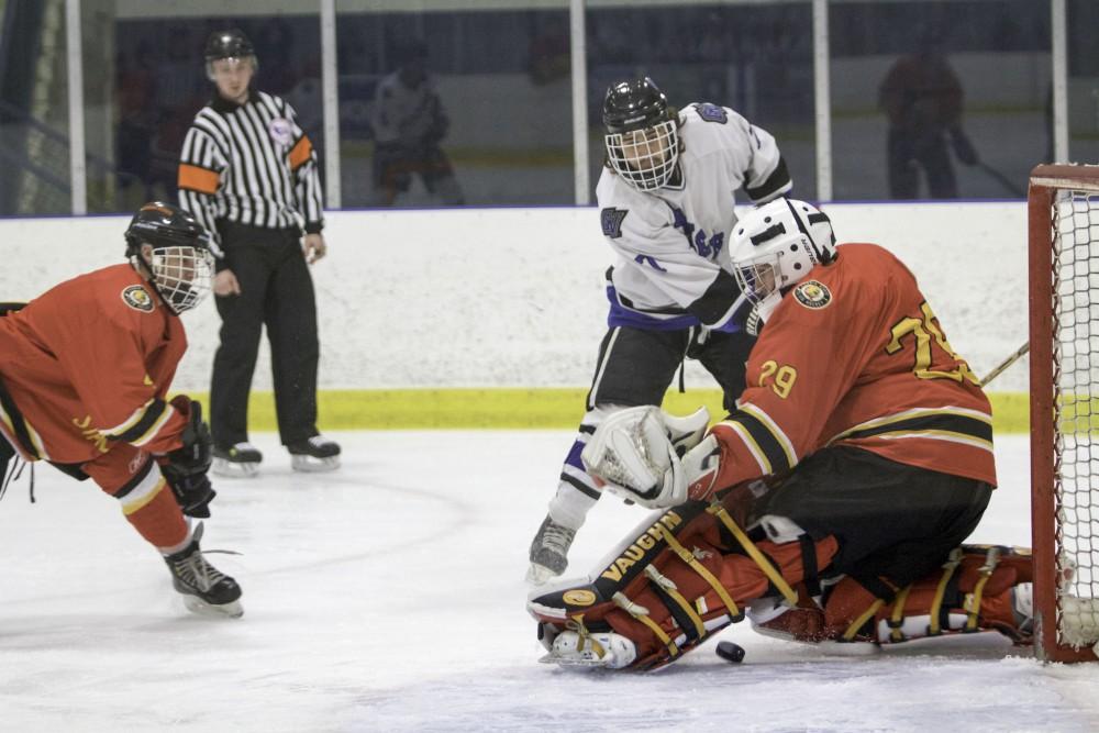 GVL / Sara Carte
Grand Valley’s DII Hockey player, Cameron Dyde, shoots to score against Ferris State at Georgetown Ice Arena on Oct. 30.