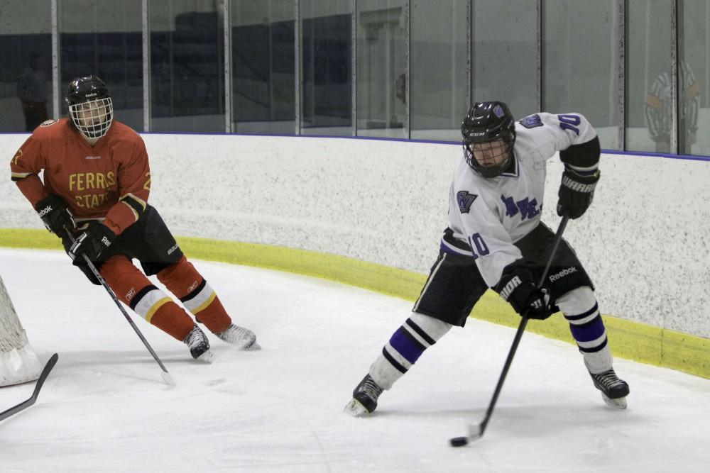 GVL / Sara Carte
Grand Valley’s DII Hockey player, Mitch Claggett, keeps the puck away from Ferris State at Georgetown Ice Arena on Oct. 30.