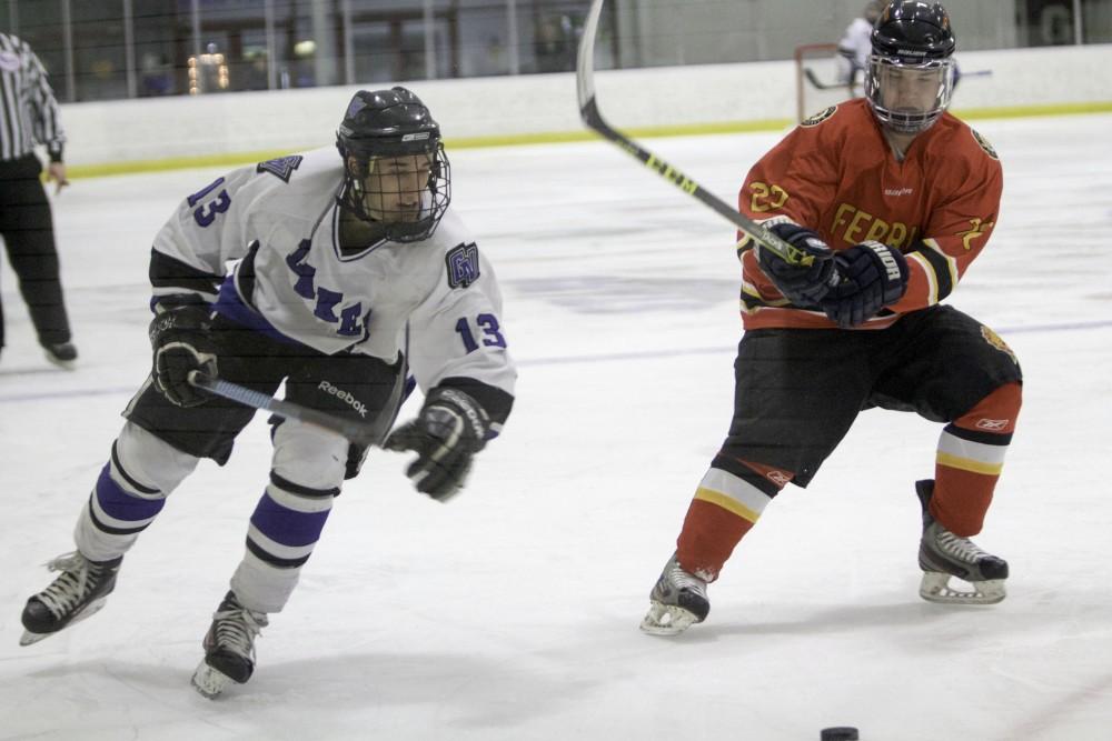 GVL / Sara Carte
Grand Valley’s DII Hockey player, Tony Russo, keeps the puck away from Ferris State at Georgetown Ice Arena on Oct. 30.