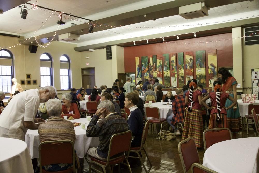 GVL / Sara Carte
People gather to celebrate the Interfaith Diwali Celebration with memebers of the West Michigan Hindu Temple at the Fountain Street Church on Oct. 30.