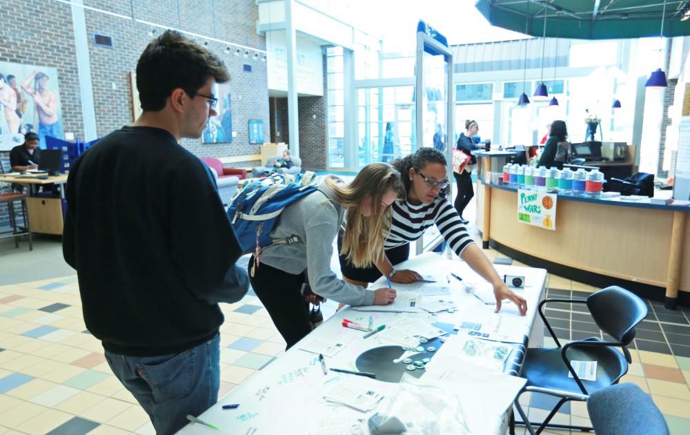 GVL / Kevin Sielaff - Samantha Przybylski and Claire Efting sign the "It's On Us" social media stand on Nov. 10 inside the Kirhof Center. 