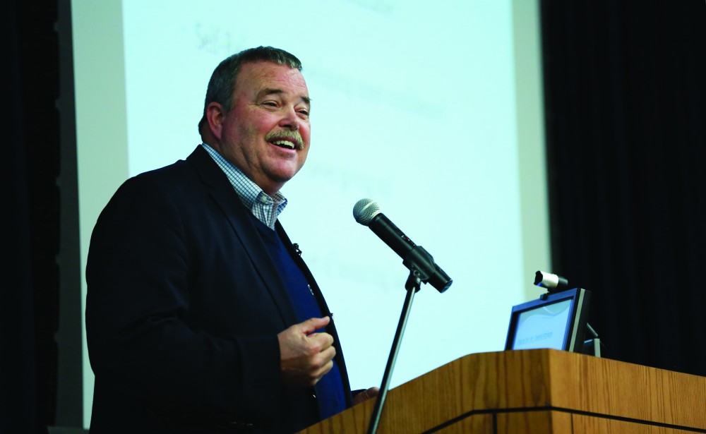 GVL / Kevin Sielaff - Dean of students Bart Merkle speaks at student senate's Last Lecture Nov. 19 at Grand Valley's Mary Idema Pew Library.