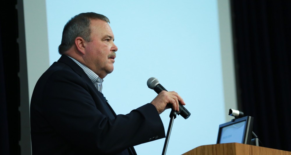 GVL / Kevin Sielaff - Dean of students Bart Merkle speaks at student senate's Last Lecture Nov. 19 at Grand Valley's Mary Idema Pew Library.