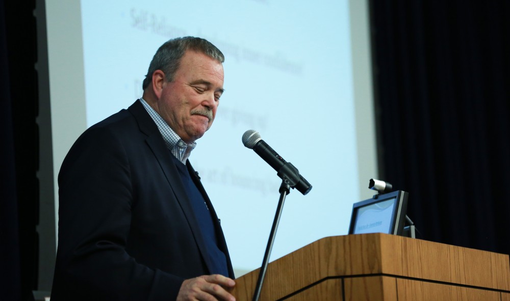 GVL / Kevin Sielaff - Dean of students Bart Merkle speaks at student senate's Last Lecture Nov. 19 at Grand Valley's Mary Idema Pew Library.