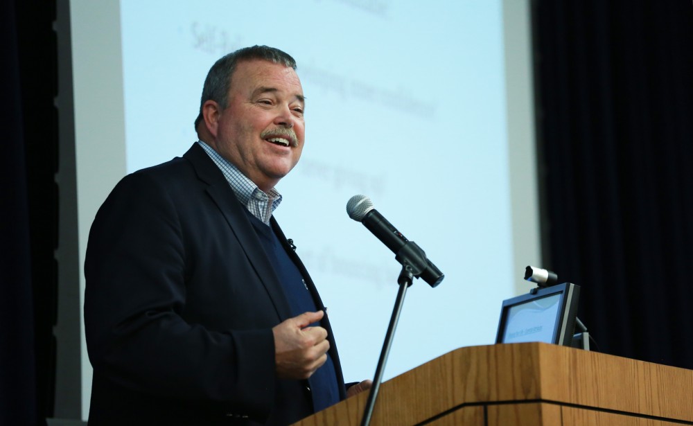 GVL / Kevin Sielaff - Dean of students Bart Merkle speaks at student senate's Last Lecture Nov. 19 at Grand Valley's Mary Idema Pew Library.