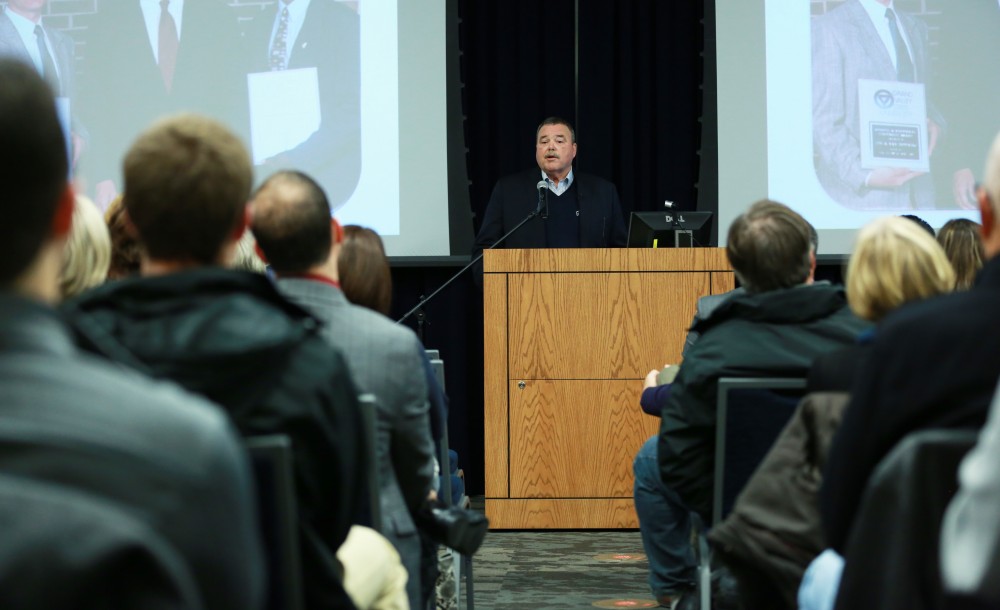 GVL / Kevin Sielaff - Dean of students Bart Merkle speaks at student senate's Last Lecture Nov. 19 at Grand Valley's Mary Idema Pew Library.