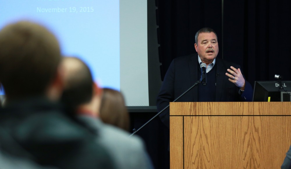 GVL / Kevin Sielaff - Dean of students Bart Merkle speaks at student senate's Last Lecture Nov. 19 at Grand Valley's Mary Idema Pew Library.