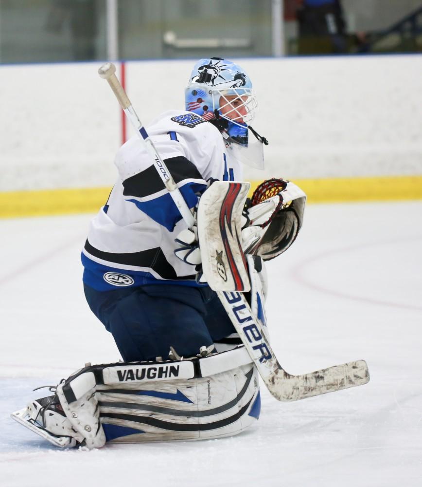 GVL / Kevin Sielaff - Goal tender Jiri Aberle (1) warms up before the game.  The Lakers square off against the Rockets from the University of Toledo Nov. 6 in Allendale.