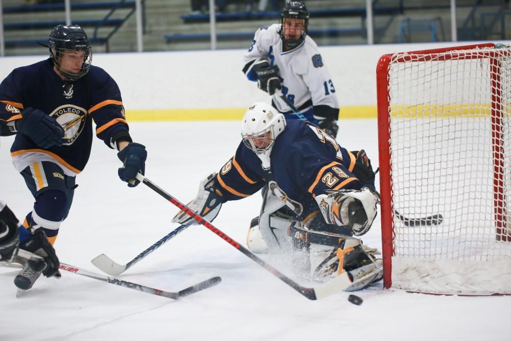 GVL / Kevin Sielaff - The Rockets' goal tender keeps the puck out of their net.  The Lakers square off against the Rockets from the University of Toledo Nov. 6 in Allendale.