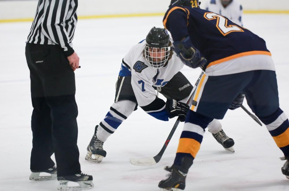 GVL / Kevin Sielaff - Cameron Dyde (7) waits for the puck drop.  The Lakers square off against the Rockets from the University of Toledo Nov. 6 in Allendale.