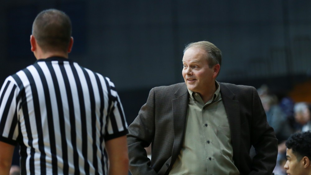 GVL / Kevin Sielaff - Head coach Ric Wesley looks on toward the play.  The Laker basketball squad defeats Grace Bible College with a final score of 83-57 Nov. 23 in the fieldhouse arena.