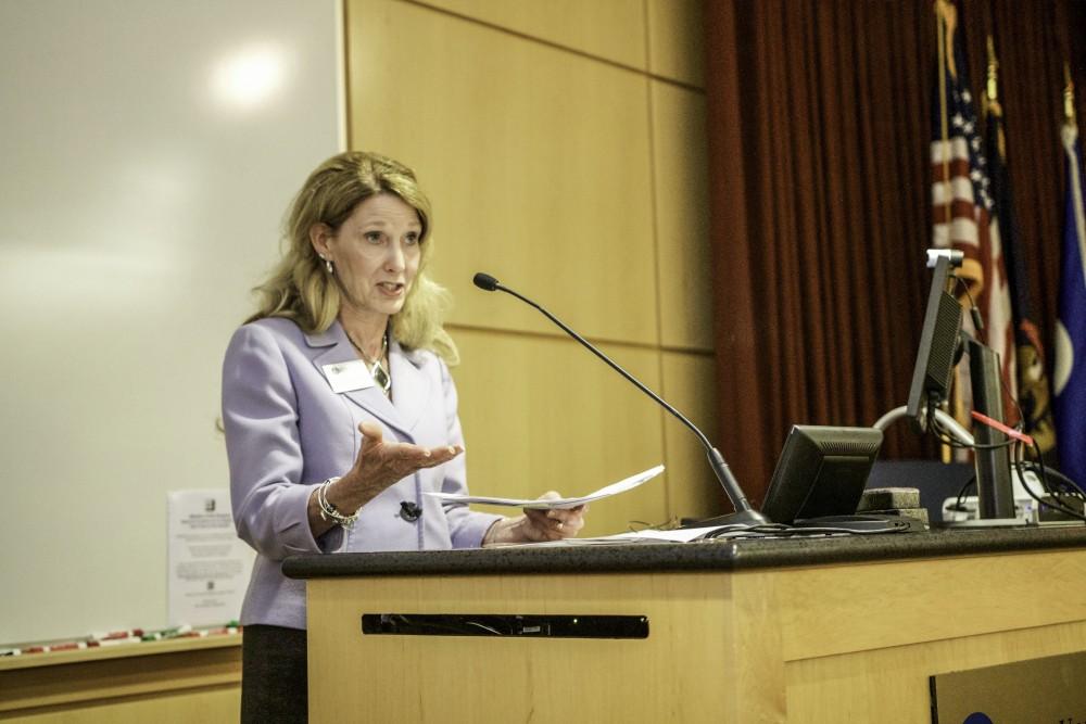 GVL / Sara Carte
Grand Valley State’s Dean of Kirkhof College of Nursing, Cynthia McCurren, presents the documentary film screening of  “Paper Tigers” in the Cook-DeVos Center for Health Sciences downtown Grand Rapids on Nov. 16.