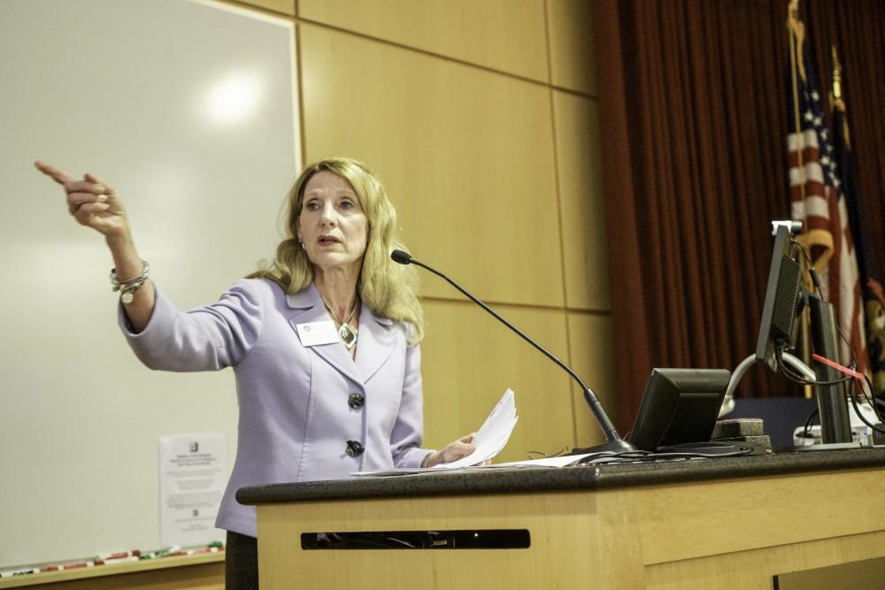 GVL / Sara Carte
Grand Valley State’s Dean of Kirkhof College of Nursing, Cynthia McCurren, presents the documentary film screening of  “Paper Tigers” in the Cook-DeVos Center for Health Sciences downtown Grand Rapids on Nov. 16.