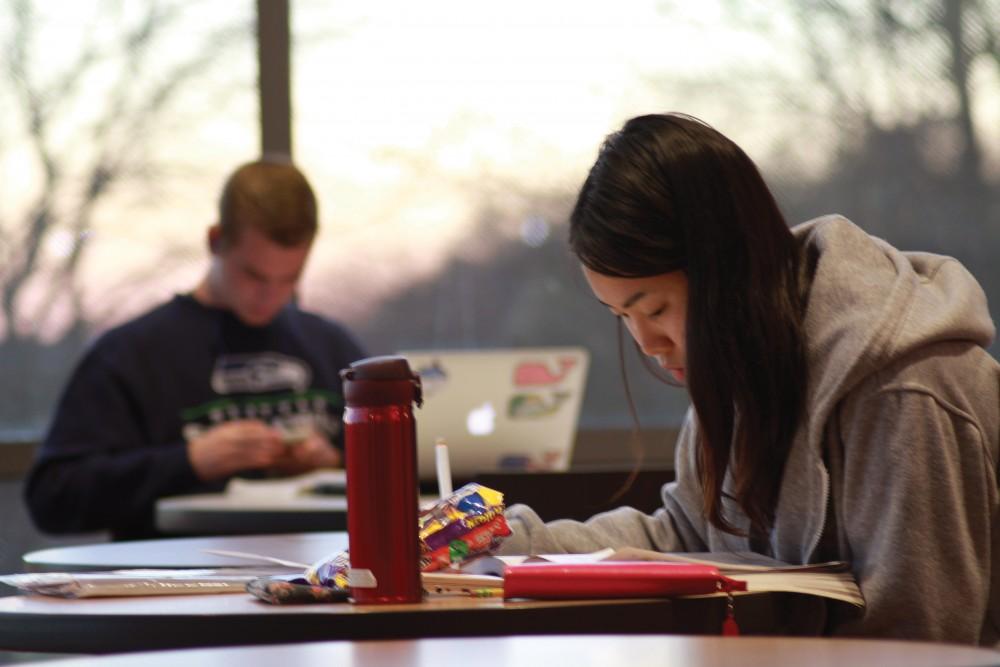 Chicho Kujiraoka, foreign exchange student, studies in the Mary Idema Pew Library on Nov. 3 in Allendale, MI. 