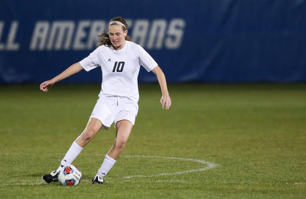 GVL / Kevin Sielaff - Shannon Quinn (10) dribbles the ball up field.  Grand Valley defeats Malone in the first round of the GLIAC tournament with a final score of 6-0 Nov. 4 in Allendale.