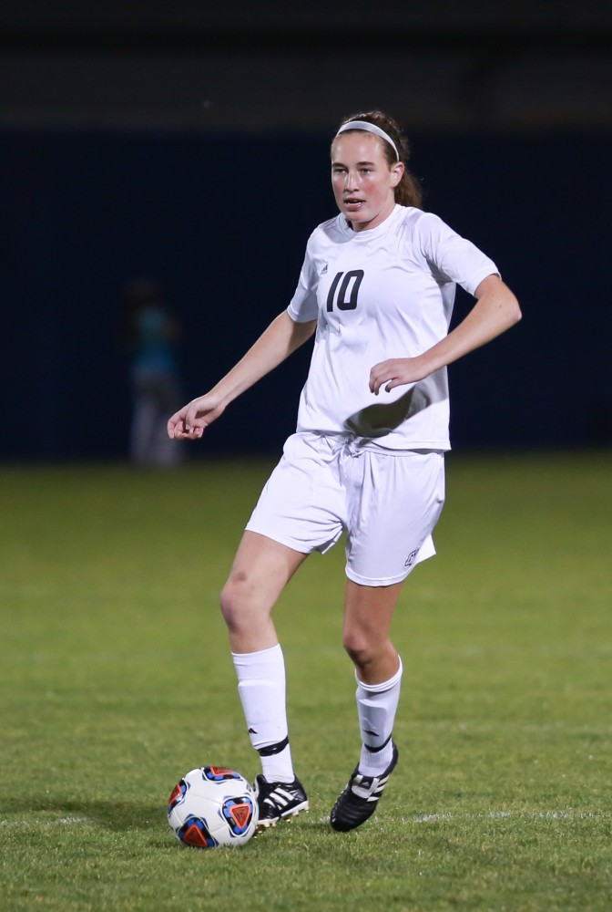 GVL / Kevin Sielaff - Shannon Quinn (10) dribbles the ball up field.  Grand Valley defeats Malone in the first round of the GLIAC tournament with a final score of 6-0 Nov. 4 in Allendale.