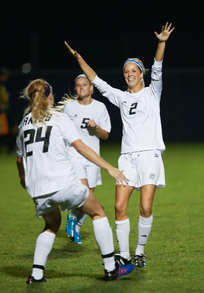 GVL / Kevin Sielaff - Katie Klunder (2) jumps for joy after opening the scoring with the game's first goal.  Grand Valley defeats Malone in the first round of the GLIAC tournament with a final score of 6-0 Nov. 4 in Allendale.