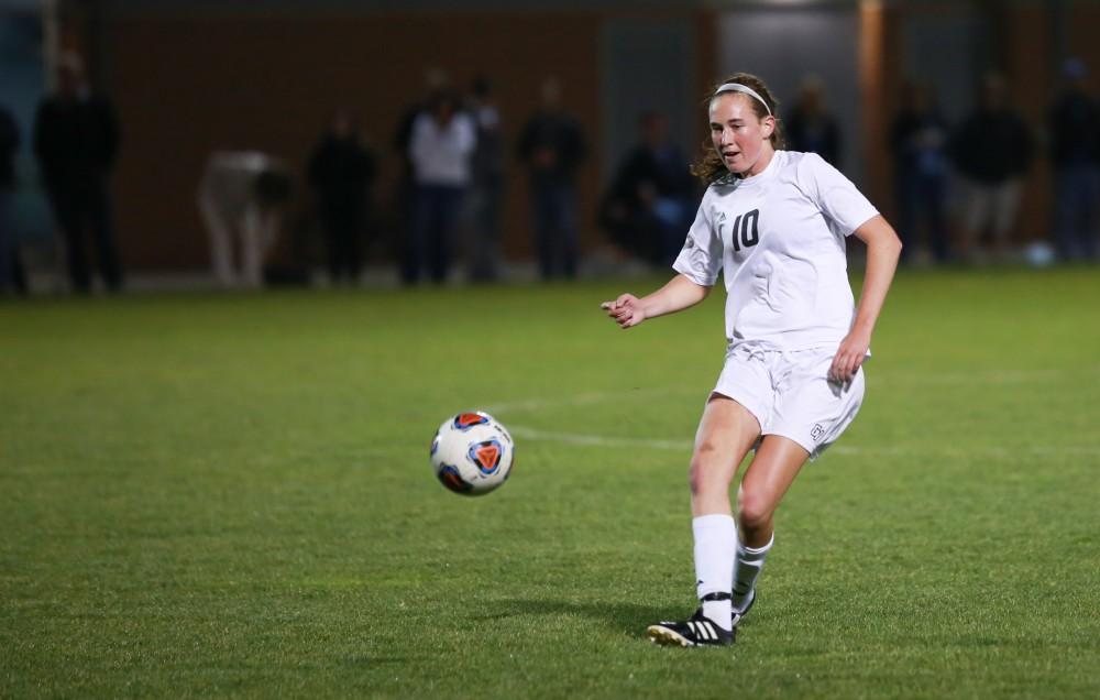 GVL / Kevin Sielaff - Shannon Quinn (10) delivers the ball into Malone's zone.  Grand Valley defeats Malone in the first round of the GLIAC tournament with a final score of 6-0 Nov. 4 in Allendale.