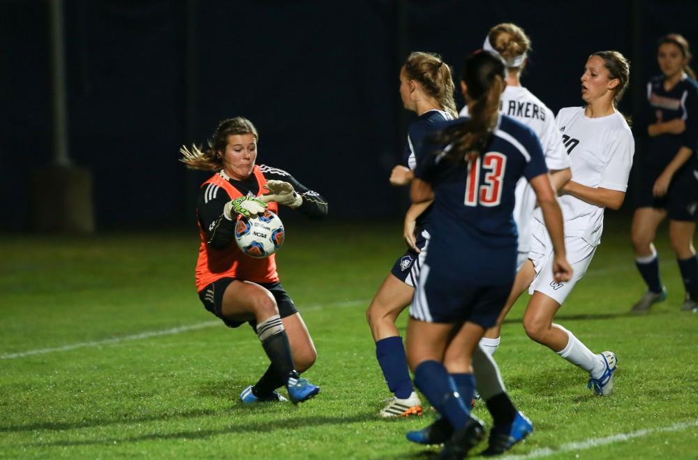 GVL / Kevin Sielaff - Gabriella Mencotti (20) tries a shot against Malone's goal keeper.  Grand Valley defeats Malone in the first round of the GLIAC tournament with a final score of 6-0 Nov. 4 in Allendale.