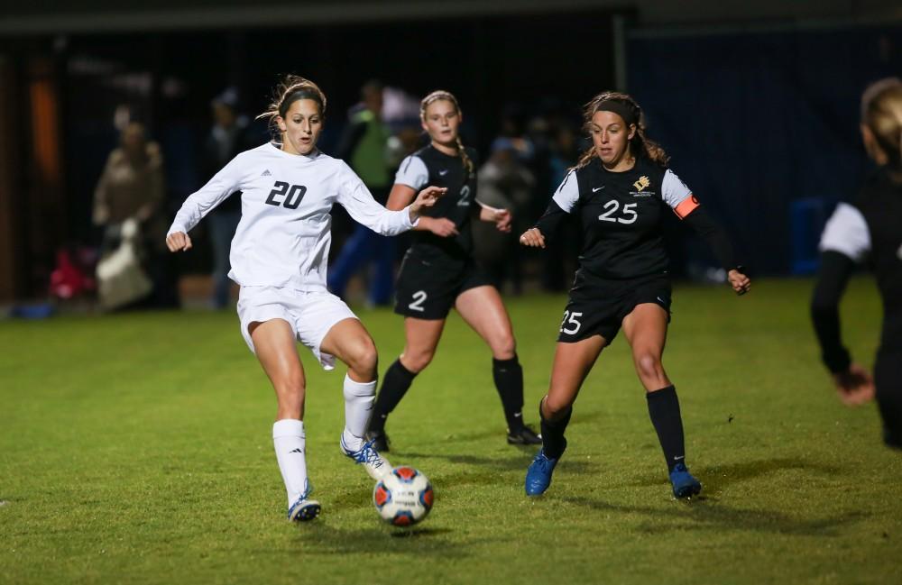 GVL / Kevin Sielaff - Gabriella Mencotti (20) plays the ball toward the opposing net.  Grand Valley defeats Ohio Dominican 3-0 in the semi-finals of the GLIAC tournament Nov. 6 in Allendale.