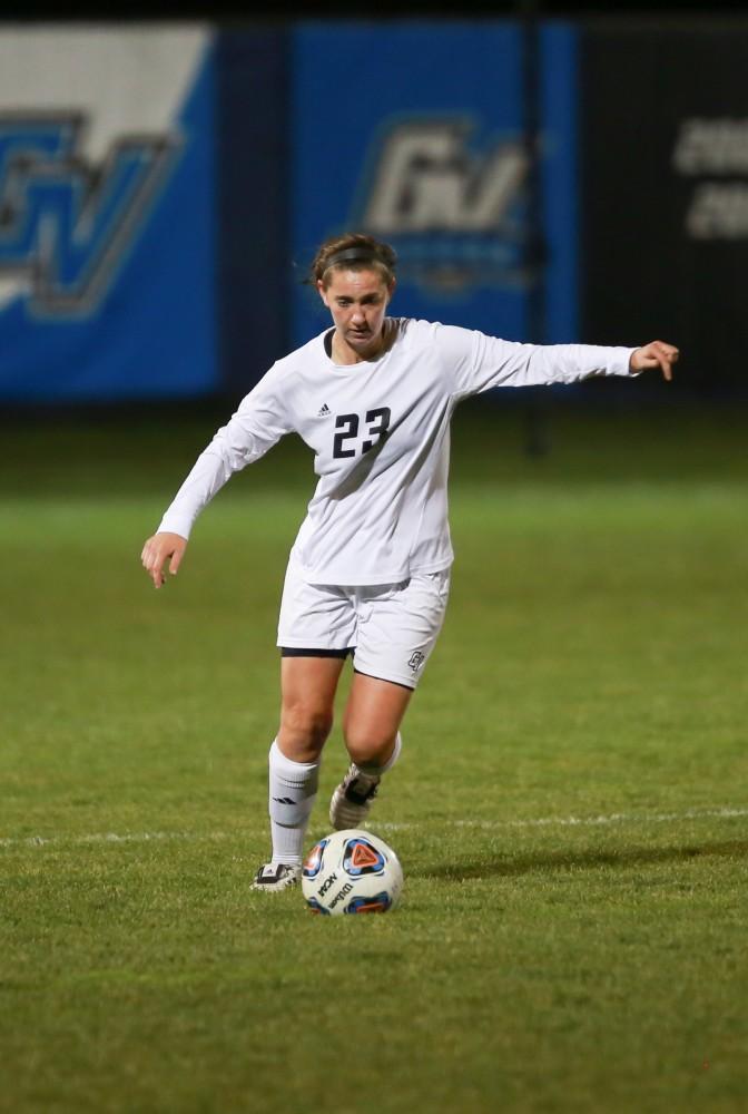 GVL / Kevin Sielaff - Katy Woolley (23) steps up to clear the ball.  Grand Valley defeats Ohio Dominican 3-0 in the semi-finals of the GLIAC tournament Nov. 6 in Allendale.