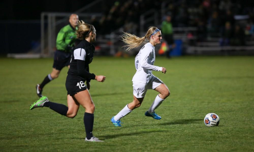 GVL / Kevin Sielaff - Kendra Stauffer (5) dribbles the ball up field.  Grand Valley defeats Ohio Dominican 3-0 in the semi-finals of the GLIAC tournament Nov. 6 in Allendale.