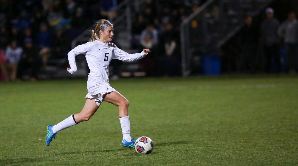 GVL / Kevin Sielaff - Kendra Stauffer (5) dribbles the ball down field.  Grand Valley defeats Ohio Dominican 3-0 in the semi-finals of the GLIAC tournament Nov. 6 in Allendale.