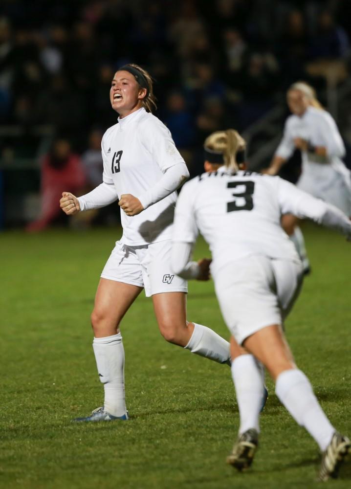 GVL / Kevin Sielaff - Marti Corby (13) celebrates the opening goal.  Grand Valley defeats Ohio Dominican 3-0 in the semi-finals of the GLIAC tournament Nov. 6 in Allendale.