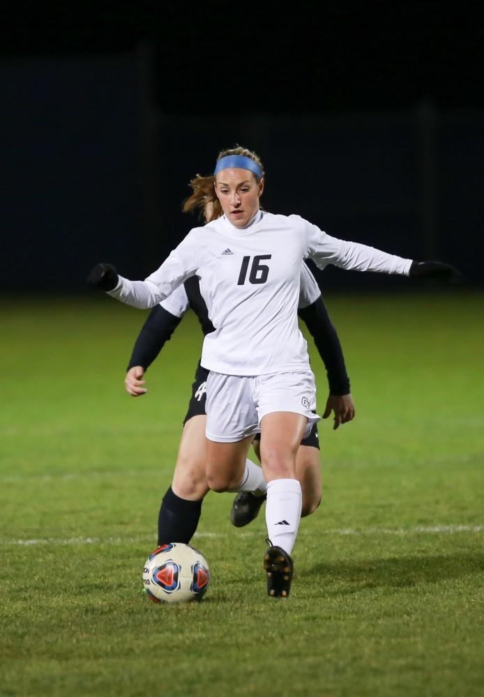 GVL / Kevin Sielaff - Dani Johnson (16) clears the ball down field.  Grand Valley defeats Ohio Dominican 3-0 in the semi-finals of the GLIAC tournament Nov. 6 in Allendale.