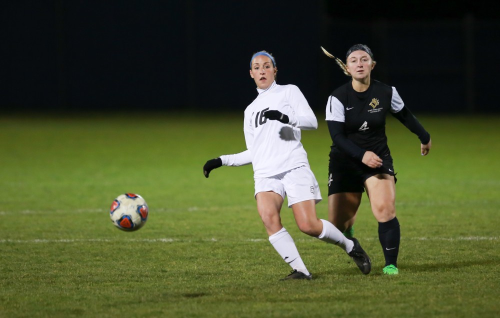 GVL / Kevin Sielaff - Dani Johnson (16) sends a pass across the field.  Grand Valley defeats Ohio Dominican 3-0 in the semi-finals of the GLIAC tournament Nov. 6 in Allendale.