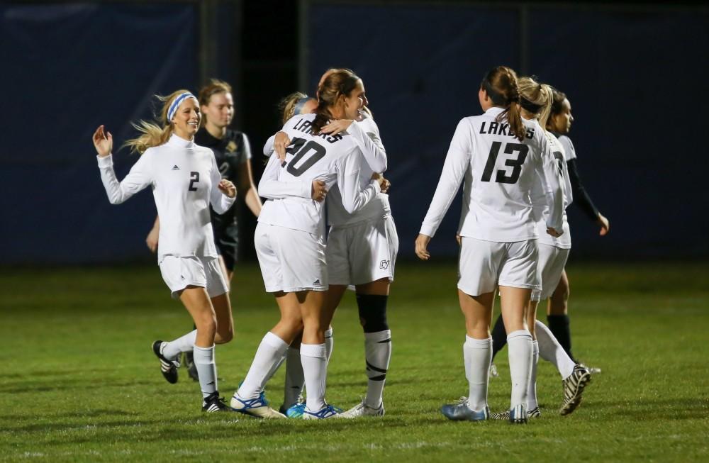 GVL / Kevin Sielaff -  The Lakers celebrate a goal by Kendra Stauffer (5).  Grand Valley defeats Ohio Dominican 3-0 in the semi-finals of the GLIAC tournament Nov. 6 in Allendale.