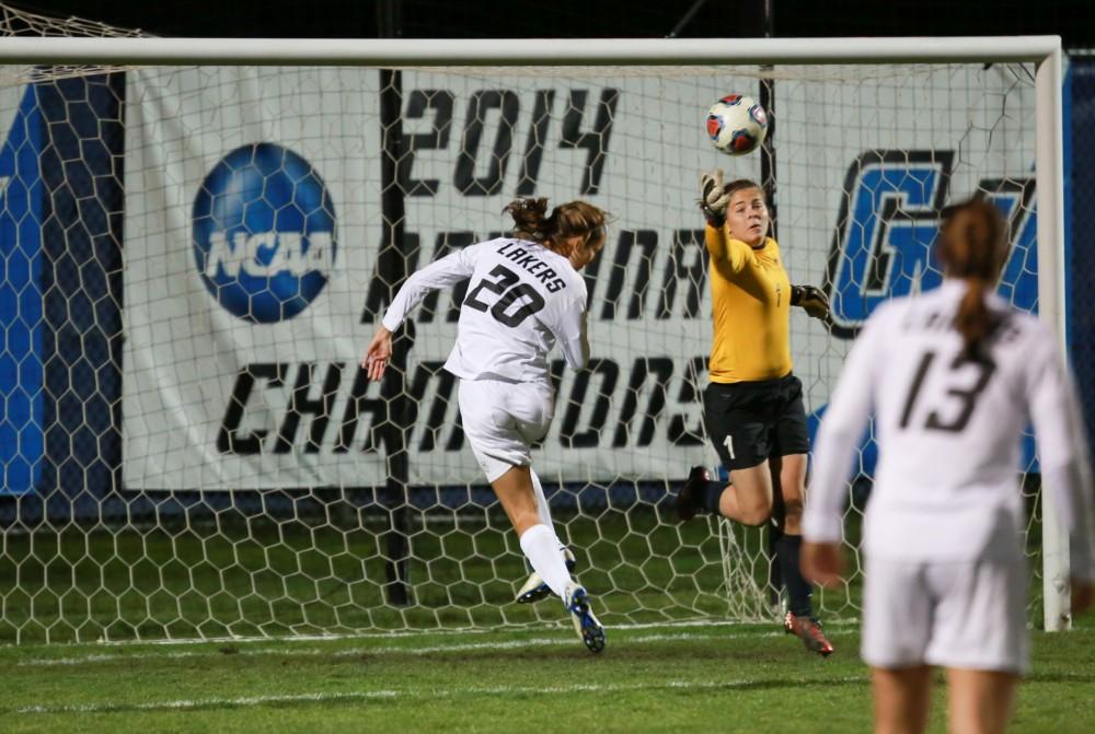 GVL / Kevin Sielaff - Gabriella Mencotti (20) attempts to head the ball into the net.  Grand Valley defeats Ohio Dominican 3-0 in the semi-finals of the GLIAC tournament Nov. 6 in Allendale.